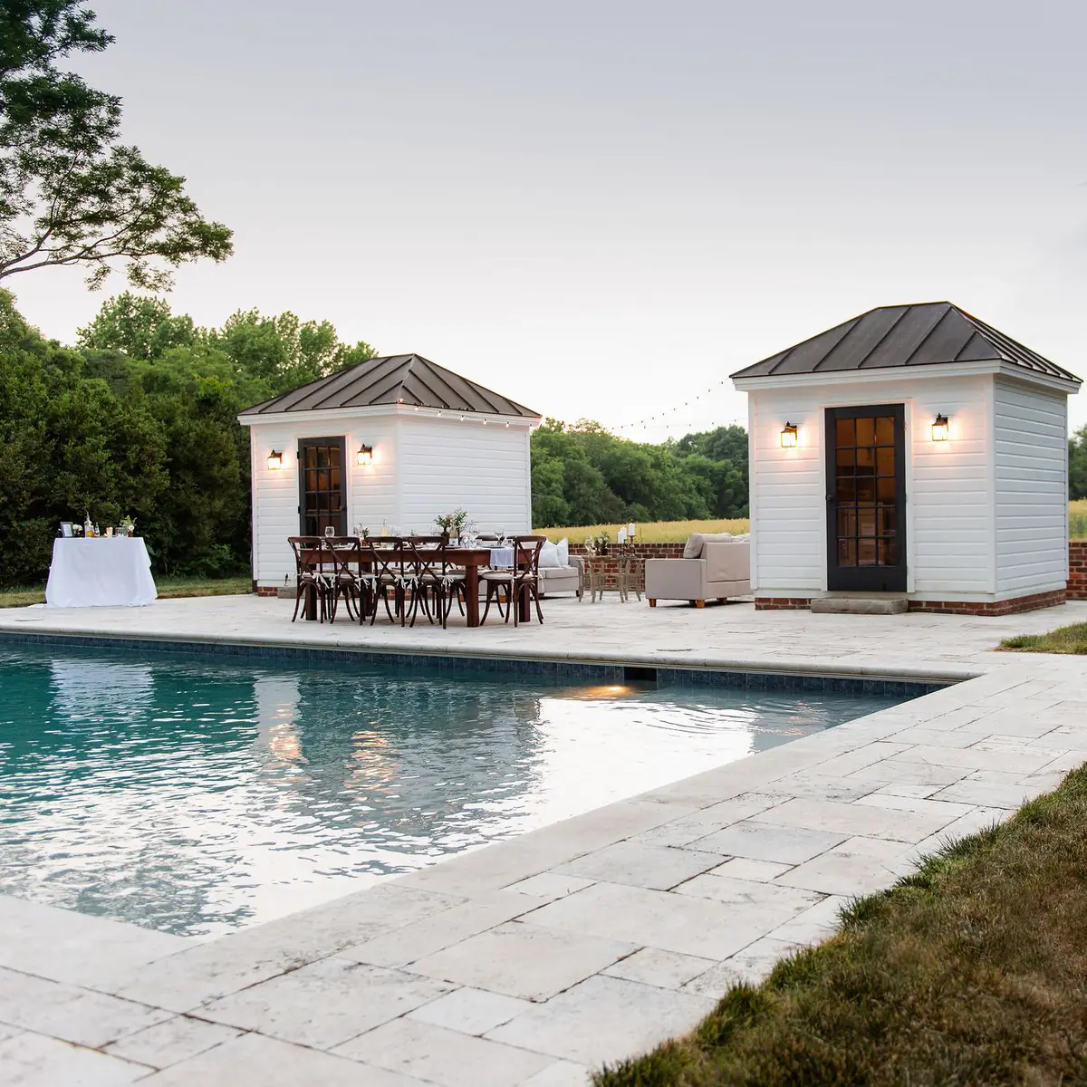 Rectangle pool with travertine pool decking