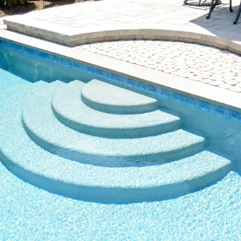 Backyard Pool with steps and stone patio
