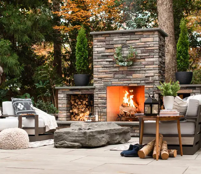 Outdoor living space with gas fireplace, pavilion, and outdoor television