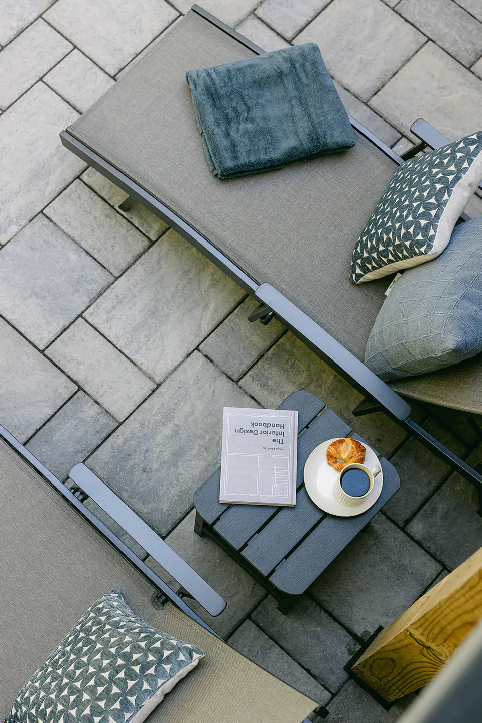 pool chairs on custom stone
