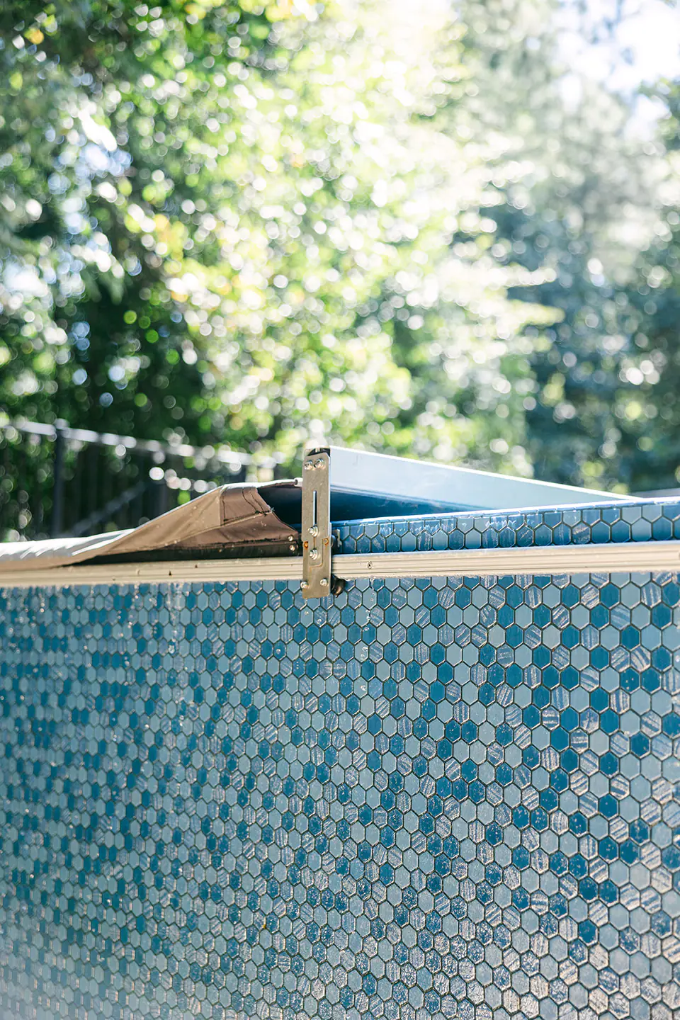 Primera Stone in Sapphire Treasure pool finish