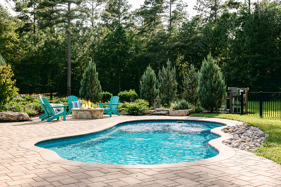 outdoor pool project custom built and installed with firepit
